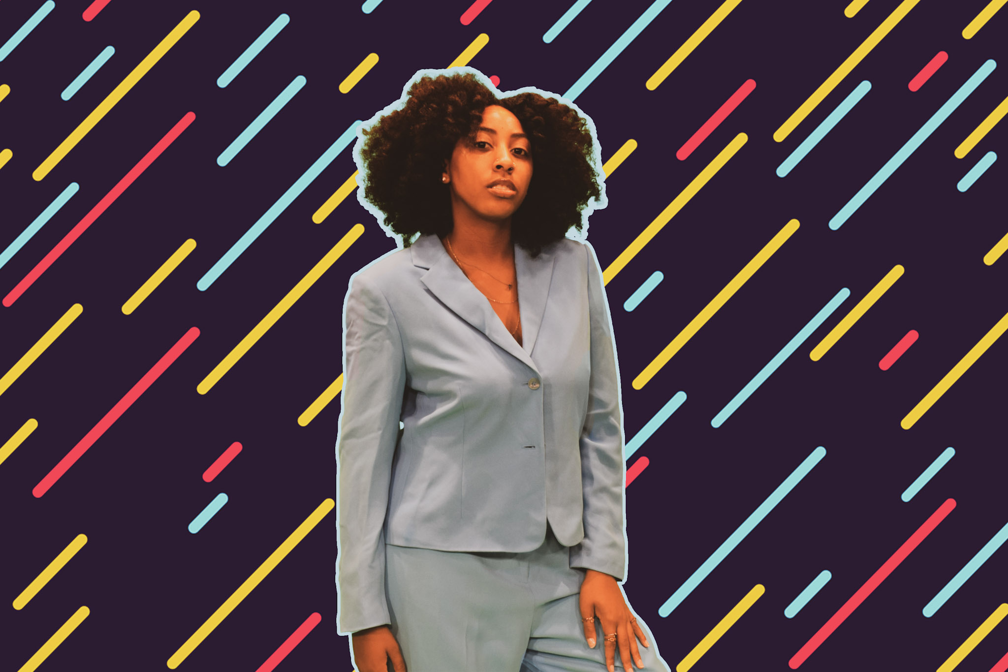 A woman looks directly into the camera